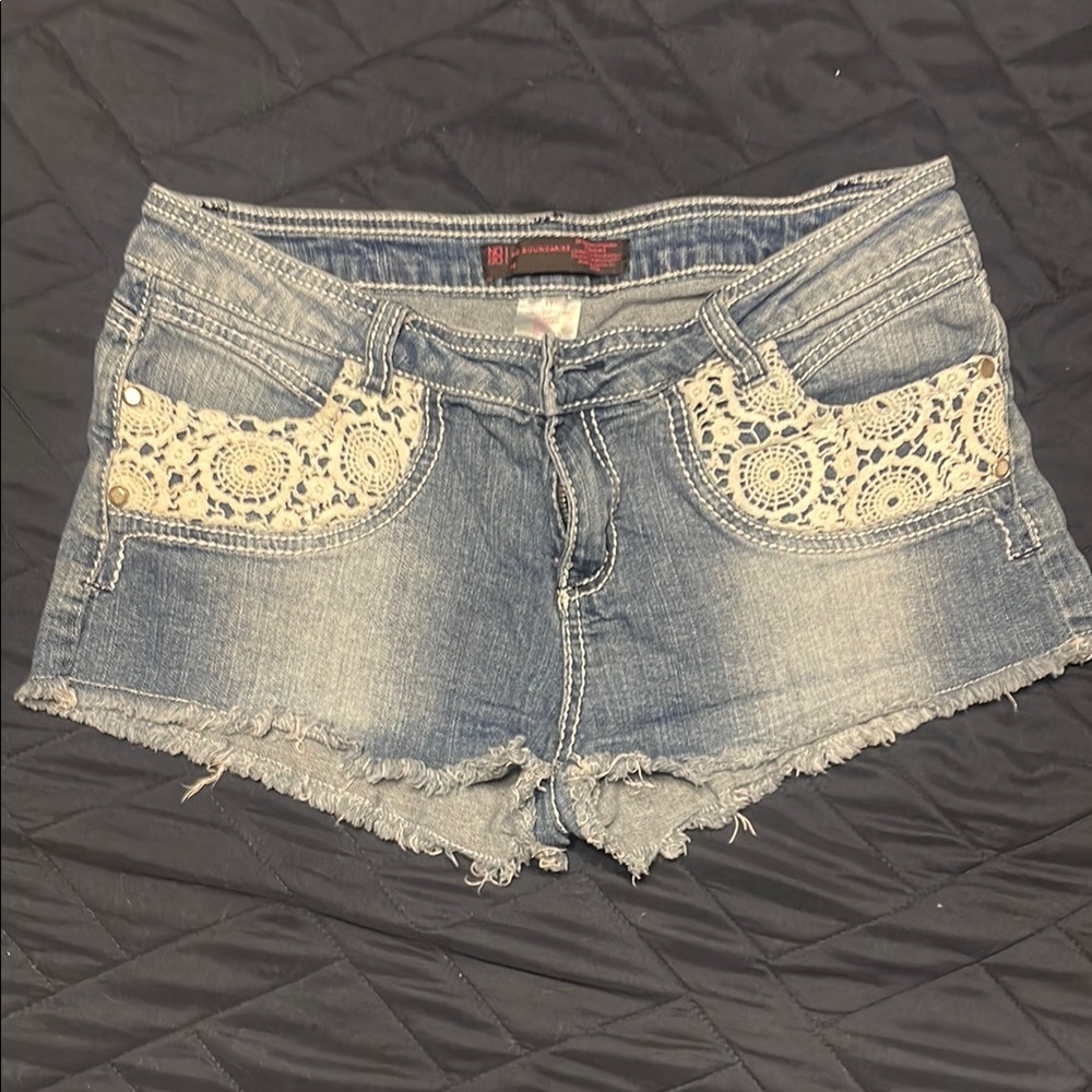 No Boundaries Blue Jean Shorts with Frayed Hem and Embroidered Lace Pockets